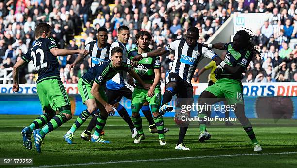 Newcastle player Moussa Sissoko shoots to score the second Newcastle goal during the Barclays Premier League match between Newcastle United and...