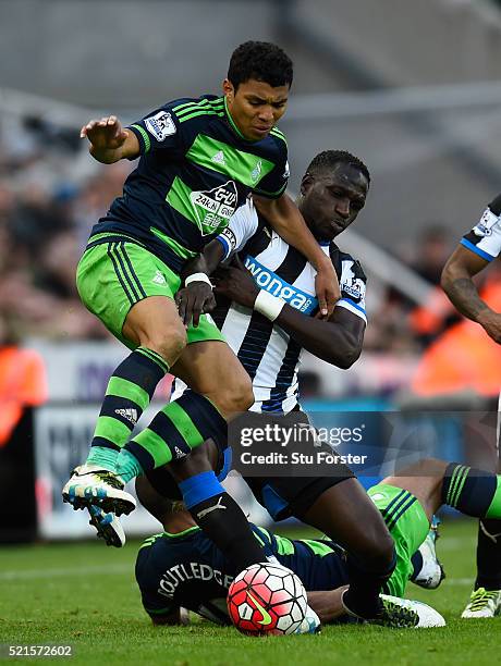 Newcastle player Moussa Sissoko challenges Jefferson Montero of Swansea during the Barclays Premier League match between Newcastle United and Swansea...