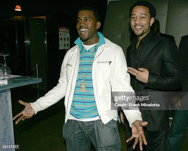 Musician John Legend and producer/rapper Kanye West at the Kanye West/John Legend GOOD Music launch party, February 7, 2005 at Duvet in New York...