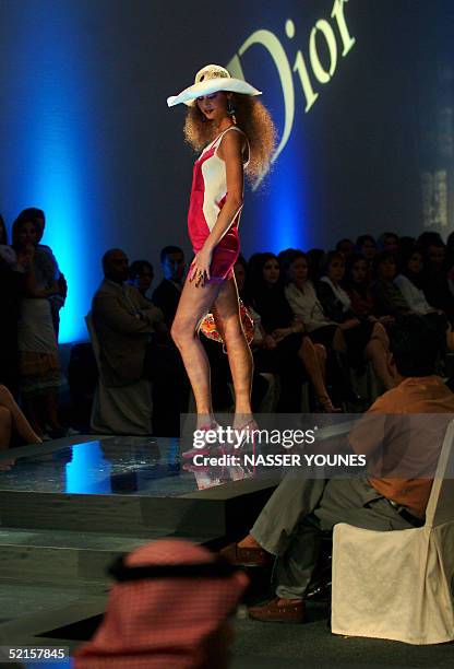 Model presents a creation from Christian Dior's Spring-Summer 2005 collection during Dubai's fashion week, sponsored by Burjuman Mall, at a five-star...