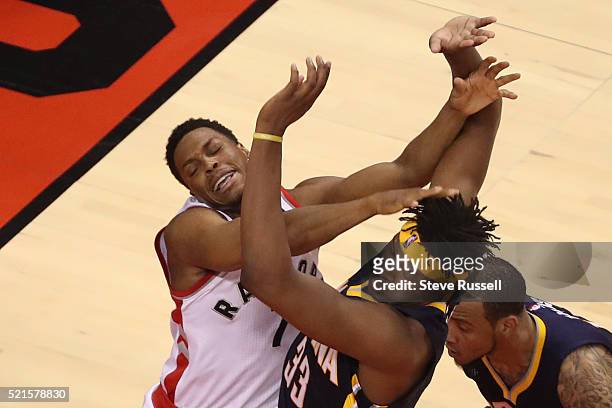 Toronto Raptors guard Kyle Lowry and Myles Turner collide under the basket as the Toronto Raptors open the NBA play-offs against the Indiana Pacers...