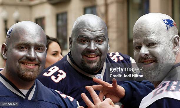 Dave Gott, Mike Cuthbertson and Fred Kapala celebrate the New England Patriot's Super Bowl victory during the Super Bowl victory parade February 8,...