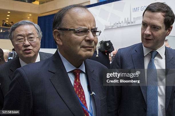 Zhou Xiaochuan, governor of the People's Bank of China, from left, Arun Jaitley, India's finance minister, and George Osborne, U.K. Chancellor of the...