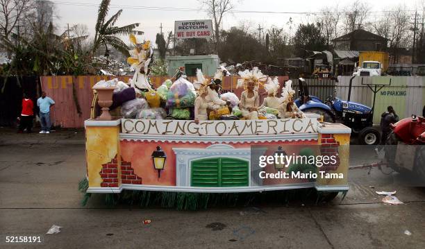 Float passes a junkyard at the start of the Zulu parade, a primarily African-American parade, during Mardi Gras festivities February 8, 2005 in New...