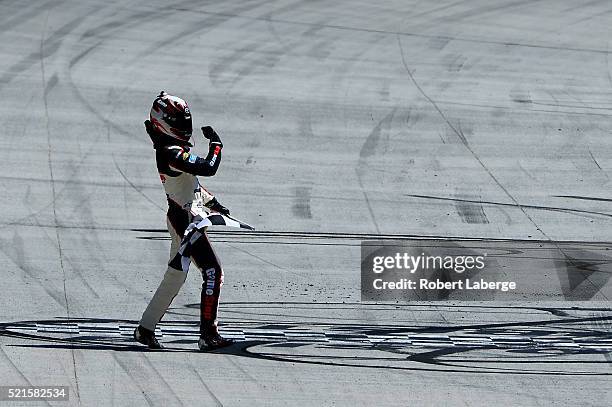 Erik Jones, driver of the Gamestop/Performance Designed Products Toyota, celebrates winning the NASCAR XFINITY Series Fitzgerald Glider Kits 300 at...