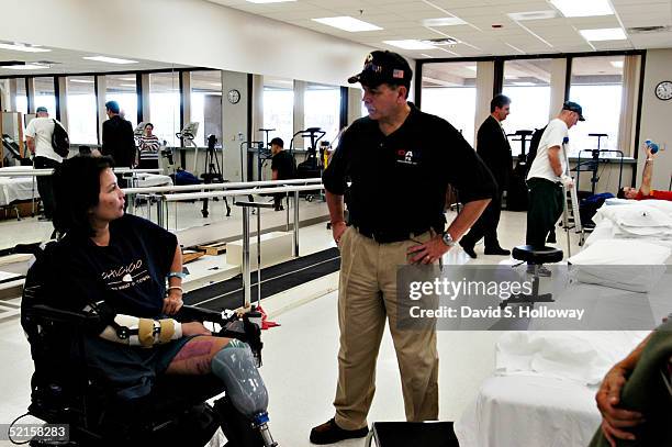 Helicopter pilot Major Ladda Tammy Duckworth, of the Illinois National Guard in Chicago, IL talks to DAV member and Vietnam Veteran Don Sioss about...