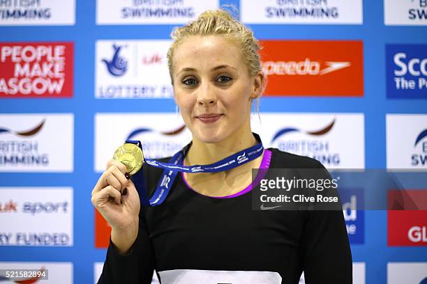 Siobhan Marie O'Connor of Great Britain poses with her Gold medal after winning the Women's 200m Individual Medley Final on day six of the British...