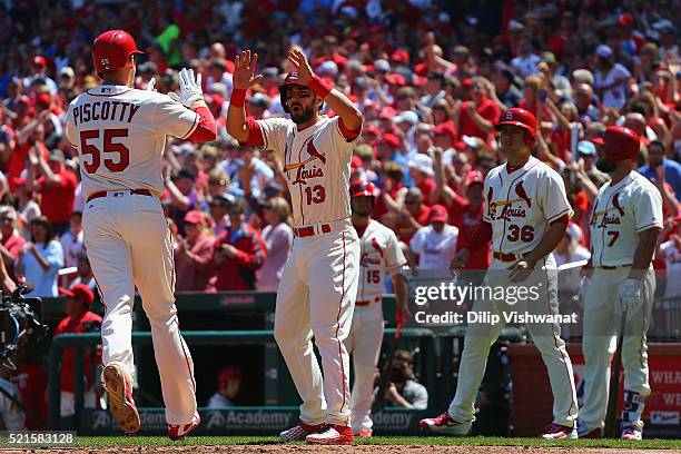 Stephen Piscotty and Matt Carpenter of the St. Louis Cardinals celebrate after Piscotty hit a three-run home run in the second inning against the...