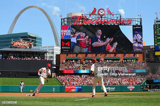 Stephen Piscotty of the St. Louis Cardinals rounds the bases after hitting a three-run home run in the second inning against the Cincinnati Reds at...