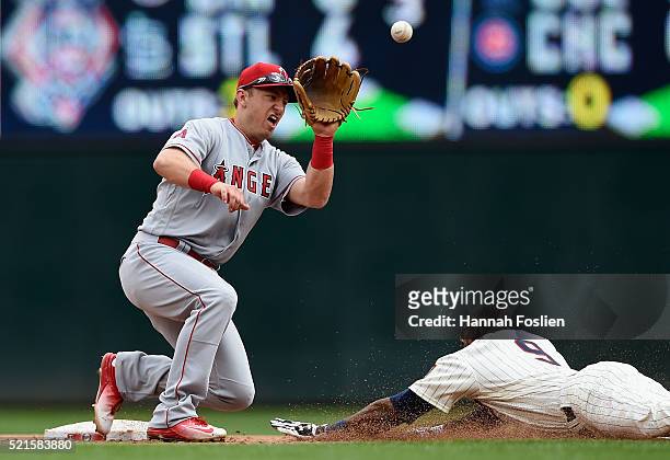 Eduardo Nunez of the Minnesota Twins steals second base as Cliff Pennington of the Los Angeles Angels of Anaheim fields the ball during the second...