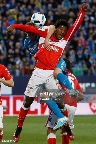 Nicolas Lombaerts of FC Zenit St. Petersburg and Ze Luis of FC Spartak Moscow vie for a header during the Russian Football League match between FC...