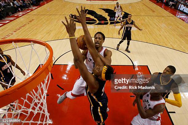 Toronto Raptors guard DeMar DeRozan goes to the bucket as he's defended by Indiana Pacers forward Myles Turner . Toronto Raptors vs Indiana Pacers in...