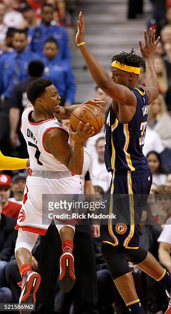 Toronto Raptors guard Kyle Lowry looks to pass after being stopped by Indiana Pacers forward Myles Turner . Toronto Raptors vs Indiana Pacers in 2nd...