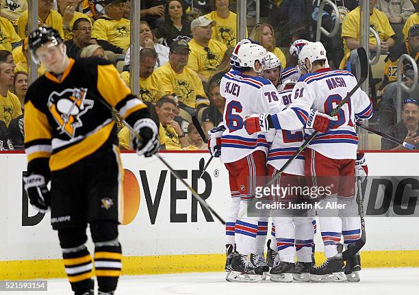 Derick Brassard of the New York Rangers celebrates with teammates after scoring in the second period in Game Two of the Eastern Conference...