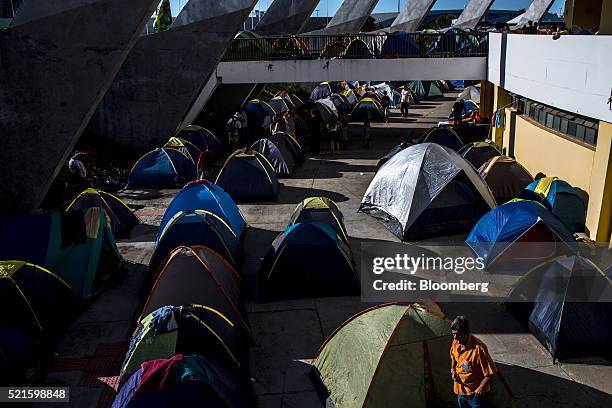 Protesters camp out in support of Dilma Rousseff, Brazil's President, and the ruling Workers Party in Brasilia, Brazil, on Saturday, April 16, 2015....