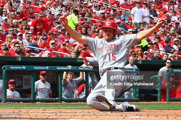 Jordan Pacheco of the Cincinnati Reds scores run against the St. Louis Cardinals in the sixth inning at Busch Stadium on April 16, 2016 in St. Louis,...