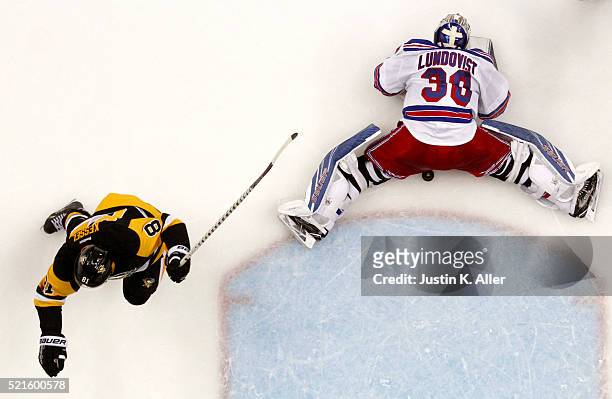 Phil Kessel of the Pittsburgh Penguins scores past Henrik Lundqvist of the New York Rangers in the second period in Game Two of the Eastern...