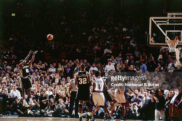 Avery Johnson of the San Antonio Spurs shoots a jump shot against the New York Knicks during Game Four of the 1999 NBA Finals at Madison Square...