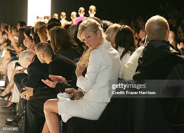 Actress Paris Hilton attends the Narciso Rodriguez Fall 2005 show during the Olympus Fashion Week at Bryant Park February 8, 2004 in New York City.