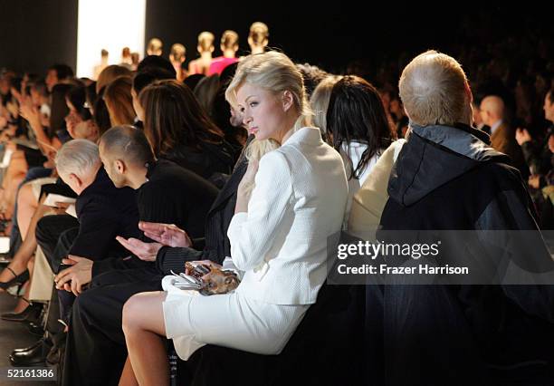 Actress Paris Hilton attends the Narciso Rodriguez Fall 2005 show during the Olympus Fashion Week at Bryant Park February 8, 2004 in New York City.