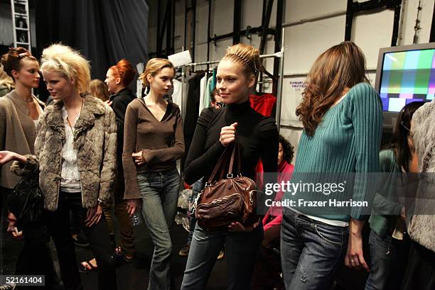 Models backstage at the Narciso Rodriguez Fall 2005 show during the Olympus Fashion Week at Bryant Park February 8, 2004 in New York City.