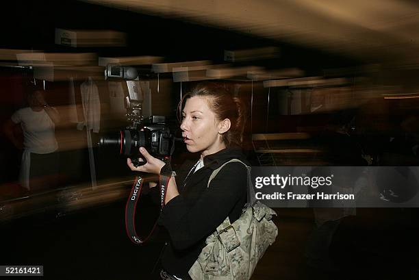 Photographer backstage at the Narciso Rodriguez Fall 2005 show during the Olympus Fashion Week at Bryant Park February 8, 2004 in New York City.