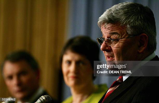 Joschka Fischer German Foreign Minister speaks while New Zealand Prime Minister Helen Clark Minister of Foreign Affairs Phil Goff listen during a...