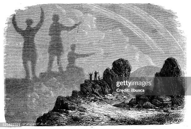 antique illustration of brocken spectre (brocken bow or mountain spectre) - brocken spectre stock illustrations