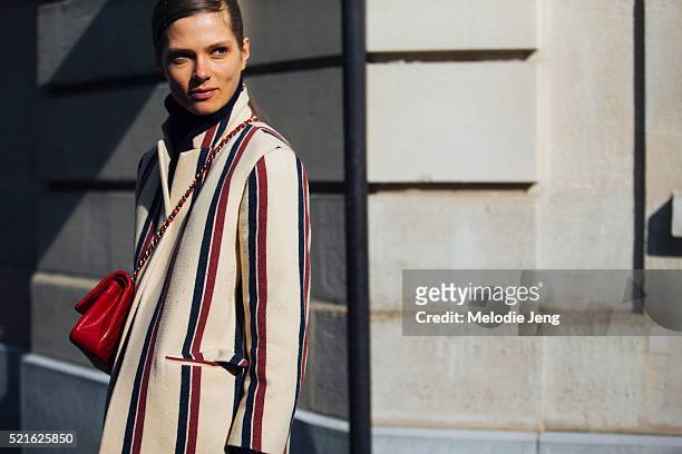 Danish model Caroline Brasch Nielsen exits the Acne Studios show at Hotel Potocki in a Dries Van Noten jacket on March 05, 2016 in Paris, France.