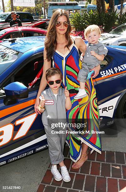 Model/Actress Lauren Michelle Hill, and her children attend the 42nd Toyota Grand Prix of Long Beach on April 16, 2016 in Long Beach, California.