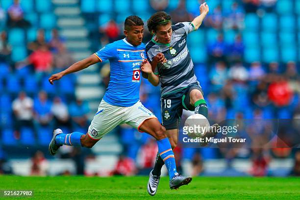 Joao Rojas of Cruz Azul fights for the ball with Jorge Villafana of Santos during the 14th round match between Cruz Azul and Santos Laguna as part of...