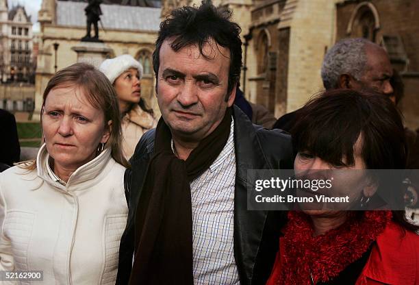 Gerry Conlon , his sister Ann Conlon and Bridie Brenan pose for photographers after listening to Prime Minister's Questions at the Houses of...