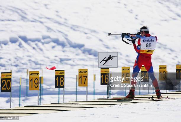 Competitor shoots during the Mens 20 Km individual race at The E.On Ruhgas IBU Biathlon World Cup on Feburary 9, 2005 in Cesana San Sicario, Italy.