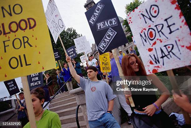 protesting impending iraq war - impending stock pictures, royalty-free photos & images