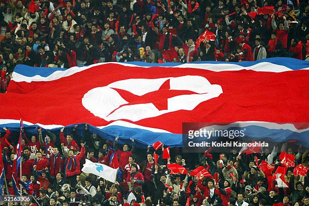 North Korean supporters enjoy the atmosphere during the 2006 FIFA World Cup Asian qualifying match between Japan and North Korea at Saitama Stadium...