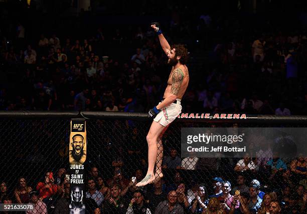 Michael Chiesa celebrates his submission victory over Beneil Dariush in their lightweight bout during the UFC Fight Night event at Amalie Arena on...