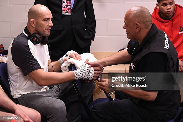 Glover Teixeira gets his hands wrapped backstage during the UFC Fight Night event at Amalie Arena on April 16, 2016 in Tampa, Florida.