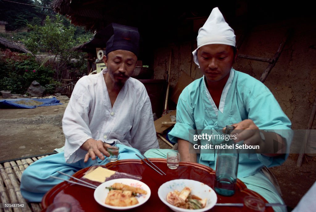 Villagers Eating Traditional Korea Meal