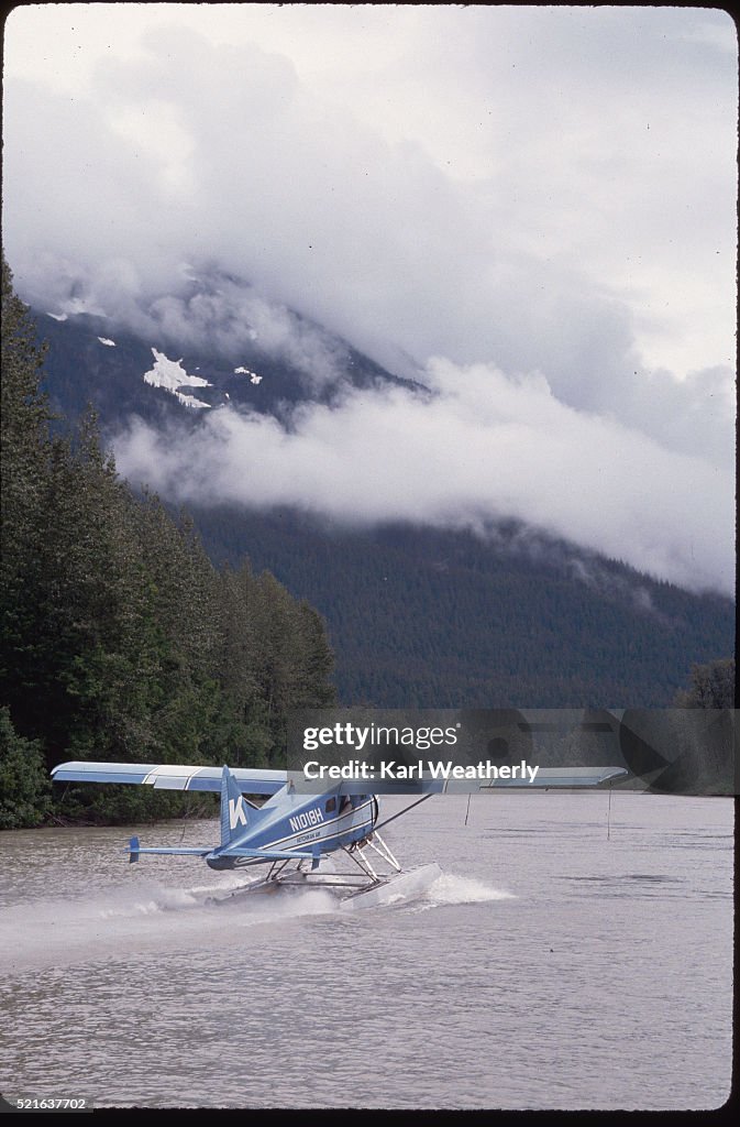 Seaplane Takes Off From the Stikine River of Alaska