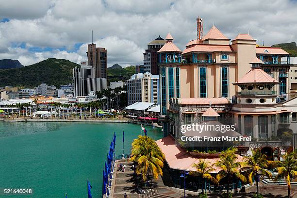 caudan waterfront at port louis on mauritius - mauritius stockfoto's en -beelden