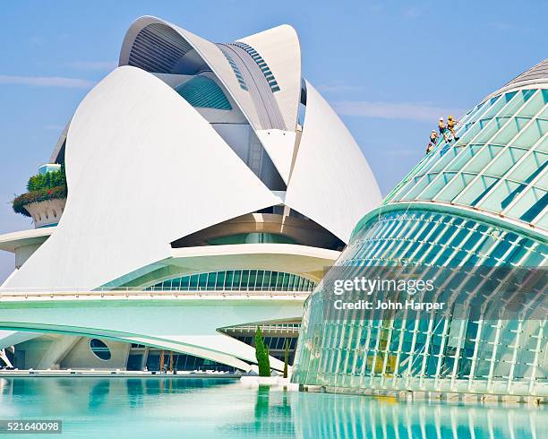 window washers on l'hemisferic at the city of arts and sciences - lhemisferic stock pictures, royalty-free photos & images