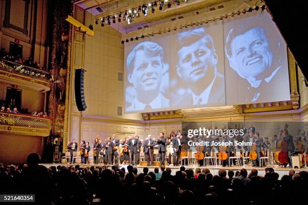 kennedy brothers projected at symphony hall concert performance, boston pops - the boston pops orchestra stock pictures, royalty-free photos & images