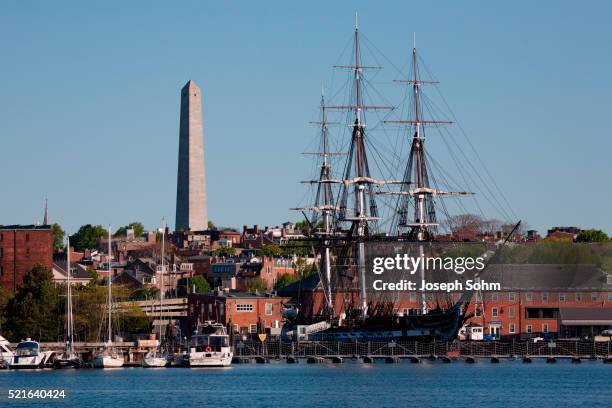 bunker hill monument and uss constitution historic ship, charlestown, boston, ma - freedom trail stock pictures, royalty-free photos & images