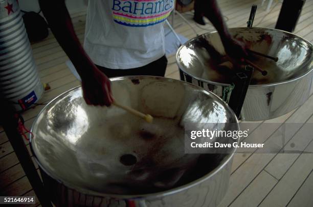 playing steel drums on board a cruise ship - ståltrumma bildbanksfoton och bilder