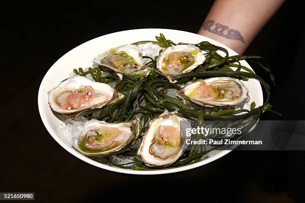 Oysters prepared by Chef Andrew Carmellini are served at the CNN Films and ZPZ Production premiere party celebrating Jeremiah Tower: The Last...