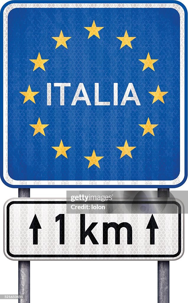 Italia bordo traffico con cartello bianco 1 km più avanti