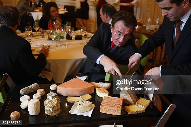 choosing cheeses during lunch at the paul bocuse institute - bocuse stock pictures, royalty-free photos & images
