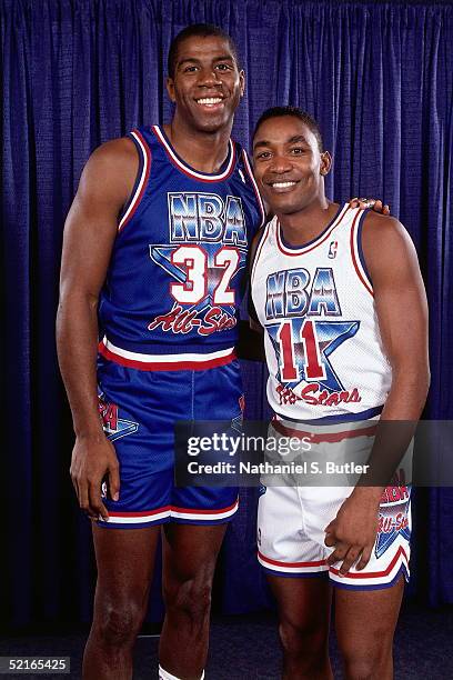 Isiah Thomas of the Eastern Conference All-Stars poses for a portrait with Earvin 'Magic' Johnson of the Western Conference after the NBA All-Star...