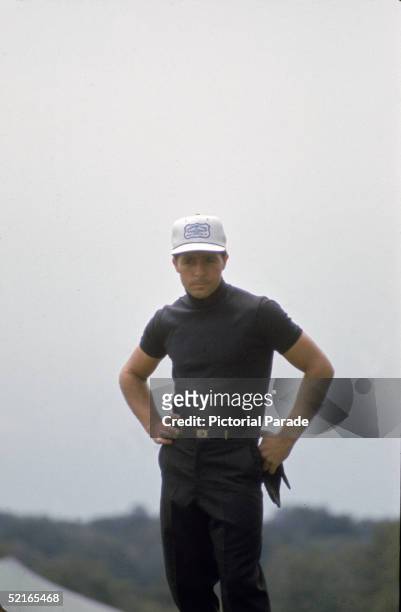 South African professional golfer Gary Player stands with arms akimbo as he examines the course of the first hole at the US Open golf tournament,...
