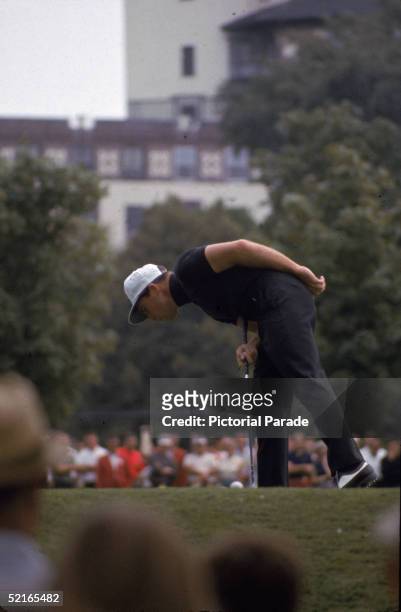 South African professional golfer Gary Player looks into something on the first hole of the US Open golf tournament, Bellerive Country Club, St....